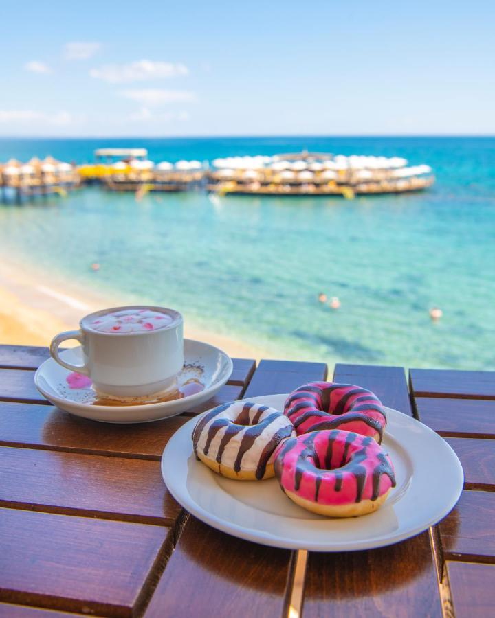 Salamis Bay Conti Resort Hotel & Casino Famagusta  Exterior photo A cup of coffee and donuts
